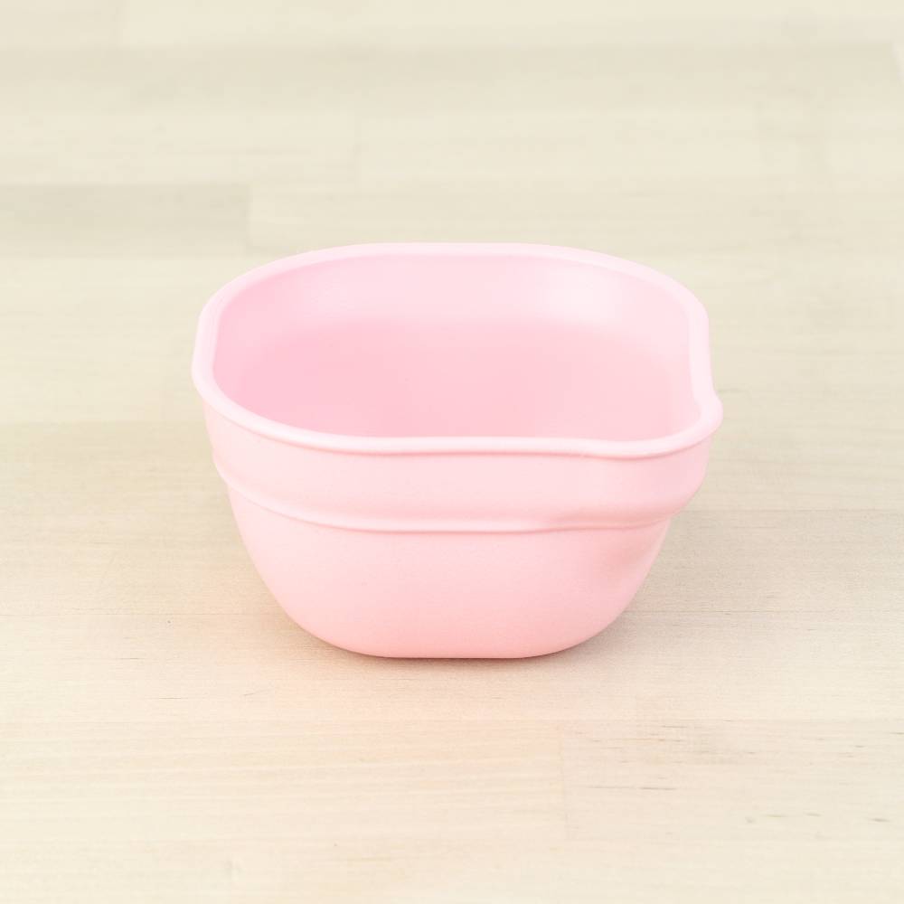 A Re-Play Dip 'n' Pour Bowl - Ice Pink on a white background