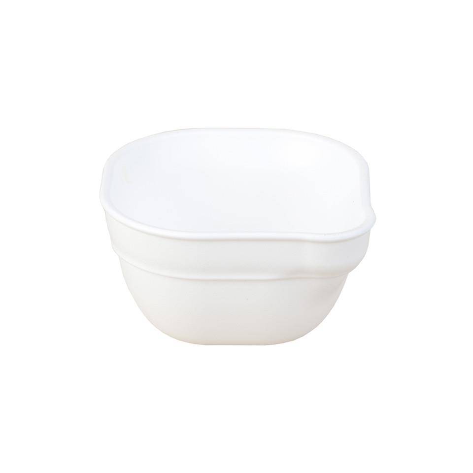 A Re-Play Dip 'n' Pour Bowl - White on a white background