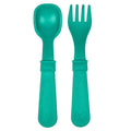 A Re-Play Fork and Spoon - Teal on a white background