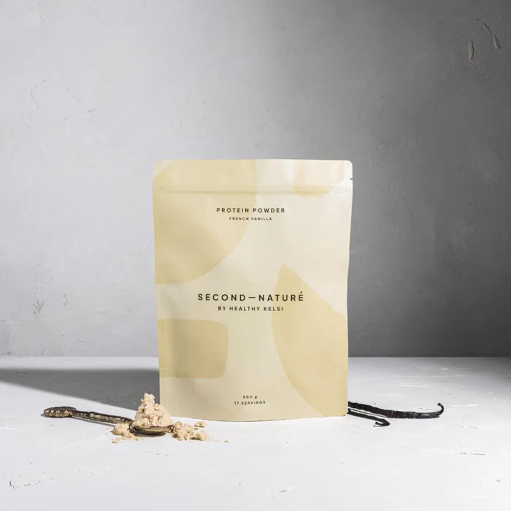 Cream Second Nature protein powder pouch against grey background.