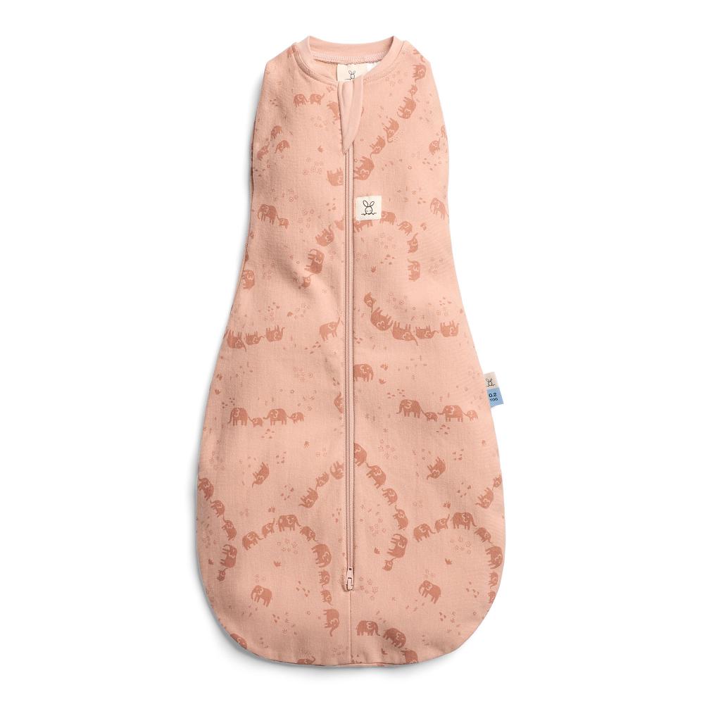 Pink baby sleeping bag with elephant pattern on a white background
