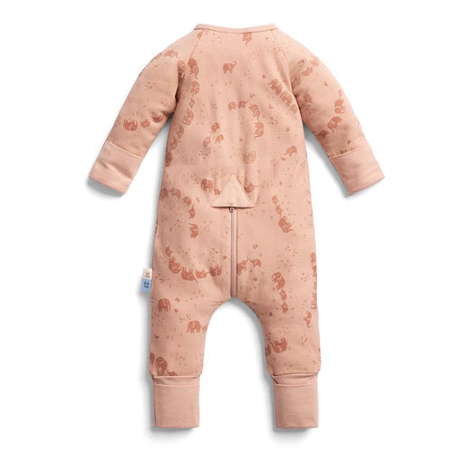 Pink baby onesie with animal pattern on a white background