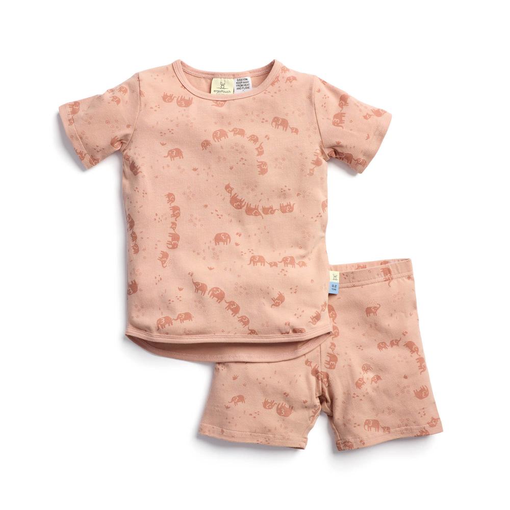 Children's pink pajama set with animal prints on a white background