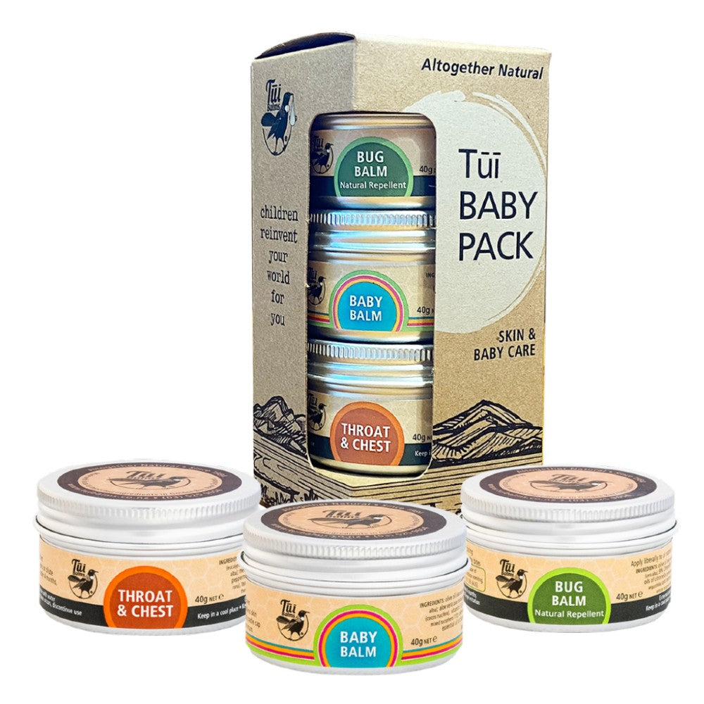 Tui Baby Pack with small tins and box against white background.