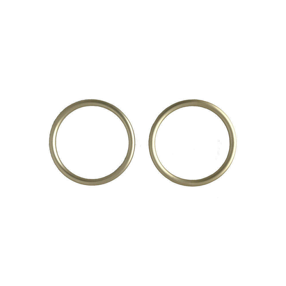 Two Gold sling rings on a white background