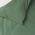 Cotton duvet cover in a solid fern green colour. 