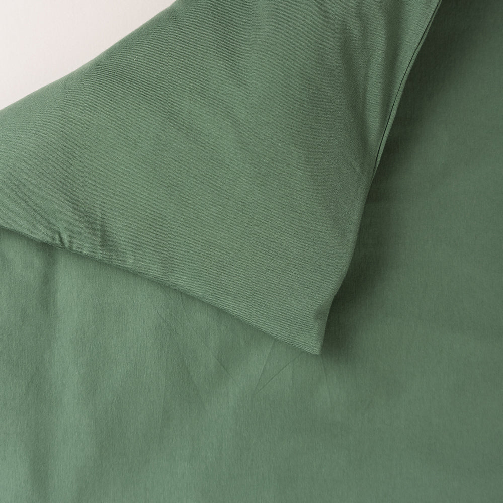 Cotton duvet cover in a solid fern green colour. 