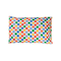 Cotton toddler pillowcase on a white background. Bright coloured check print. 