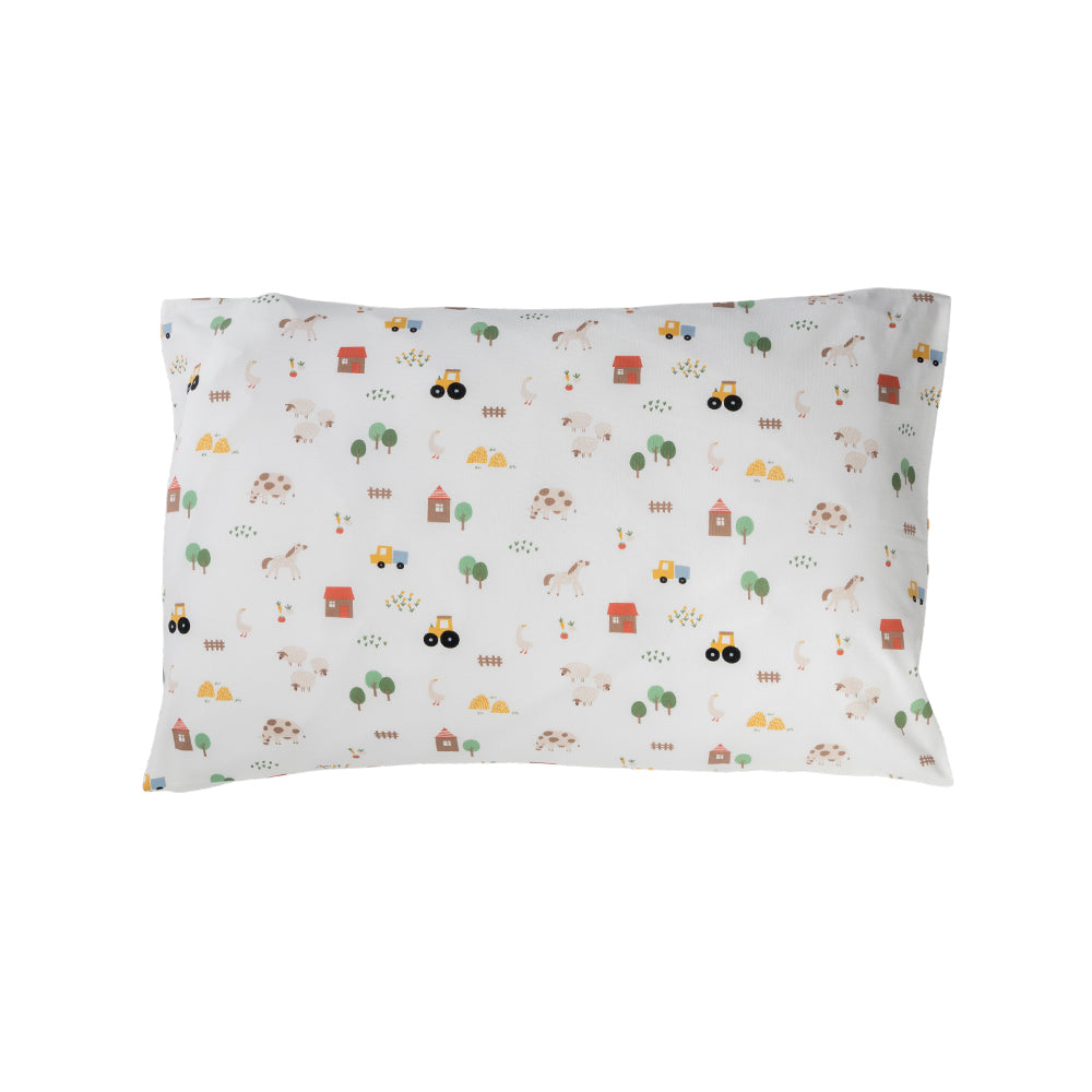 Cotton toddler pillowcase on a white background. White base with an all over farmyard print.