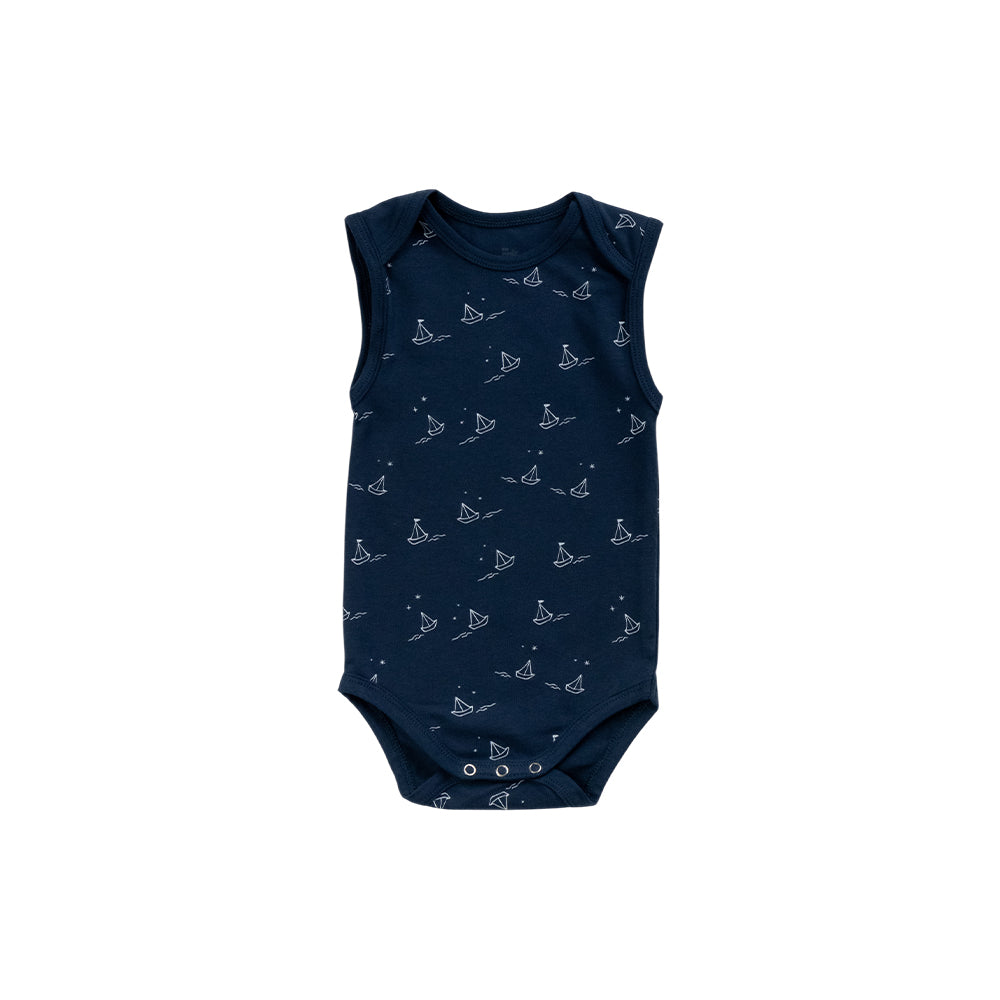 Organic cotton singletsuit on a white background. Navy blue base with an all over sailboat print. 