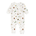 Cotton zipsuit with a farmyard print on a white background. 