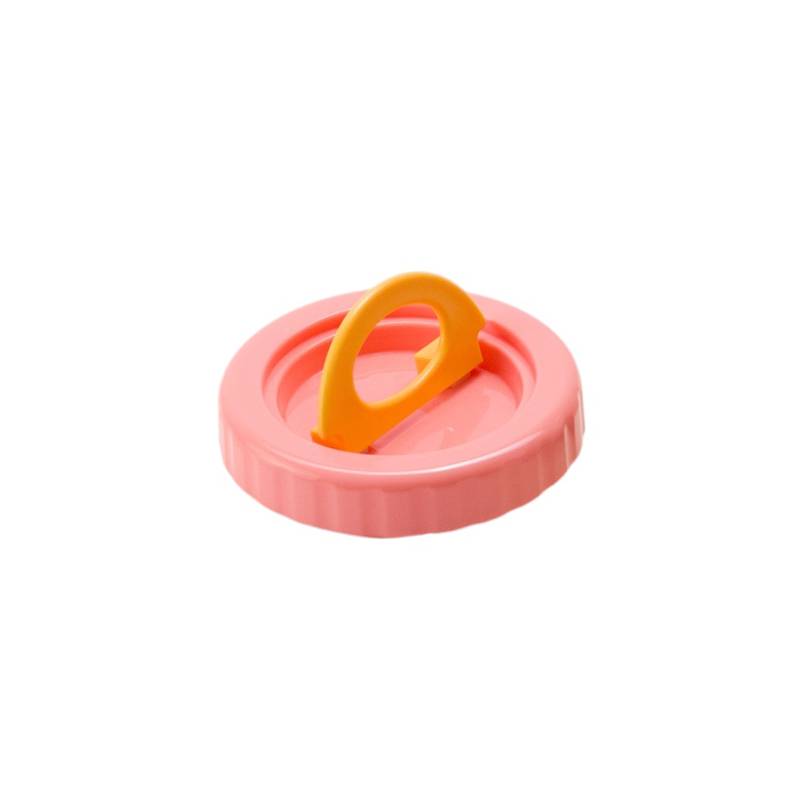Pink lid with an orange handle on a white background