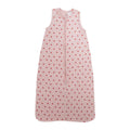 A sleeveless cotton baby sleep sack with strawberries on a pink background, shown flat against a white background.