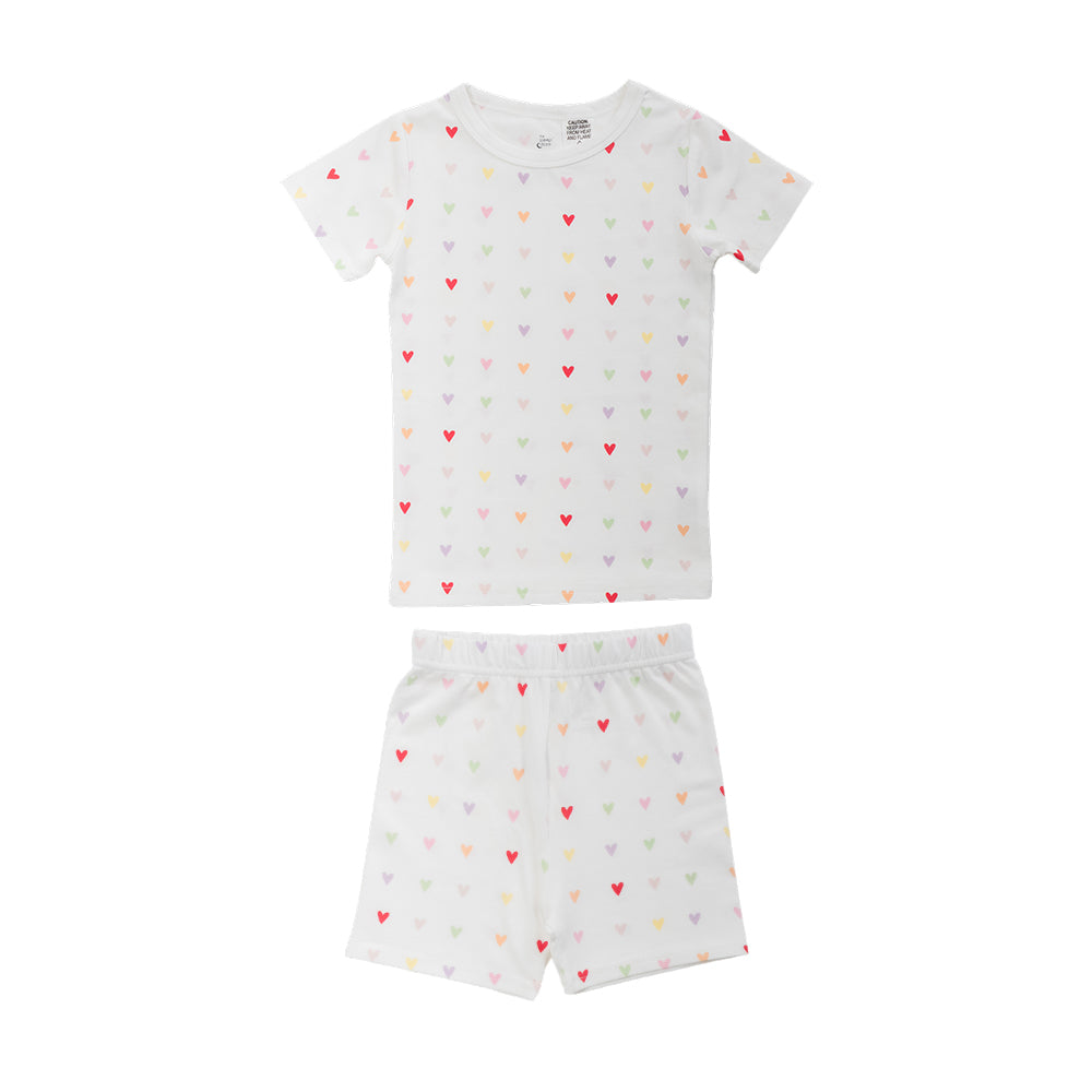 Cotton summer Pjs on a white base with an all over mini hearts print on a white background. 