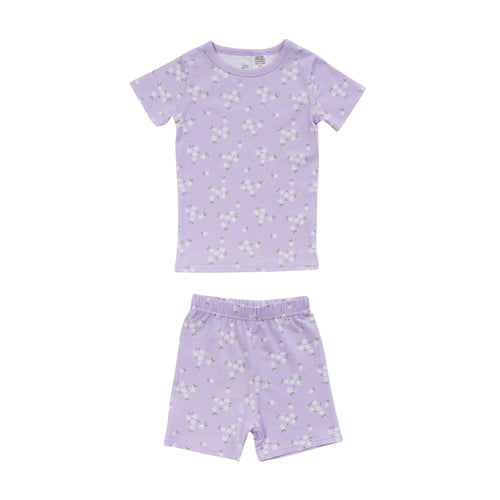 Cotton summer Pjs on a lilac base with an all over floral print on a white background. 