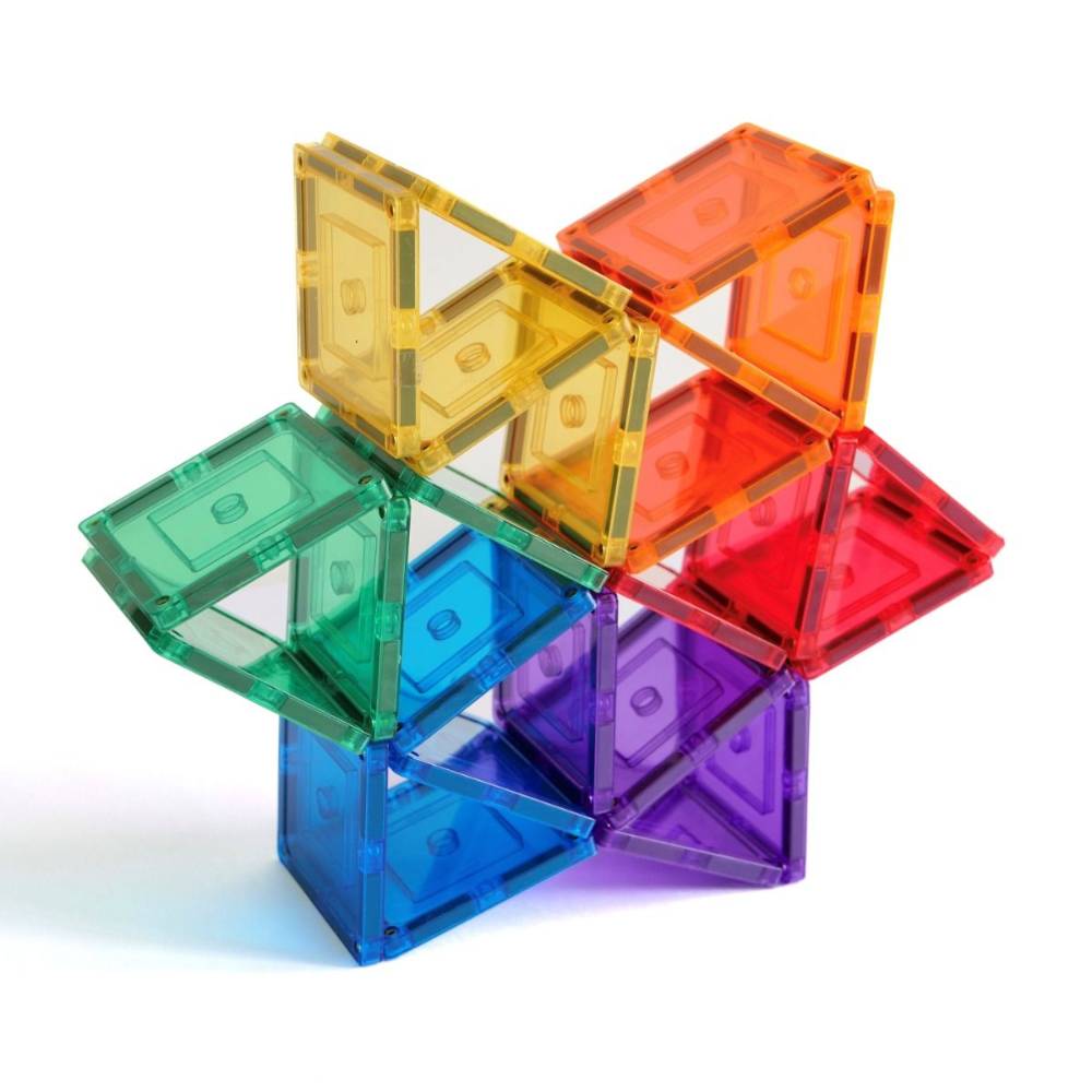 Colorful magnetic building tiles stacked on a white background