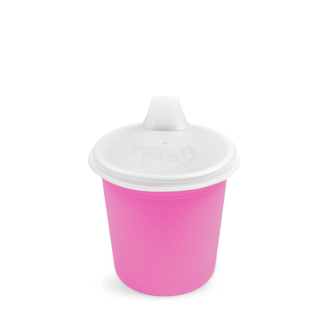 A Bright Pink Re-Play Tiny Tumbler with Lid - Bright Pink on a white background