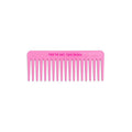Viva La Vulva hair comb against white background.