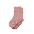 Pink baby socks with text on a white background