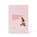 Pink postpartum planner book against white background.