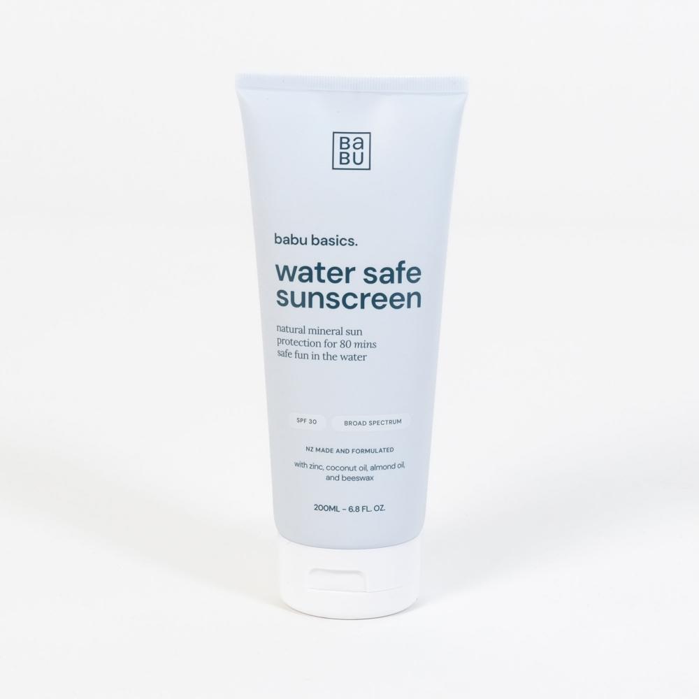 A 200ml squeeze tube of babu Basics Water Safe Sunscreen on a clean white background.