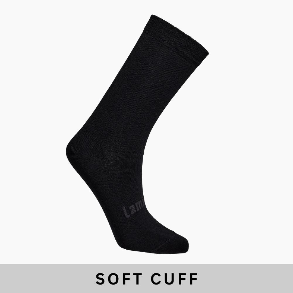 Black merino crew socks on a white background