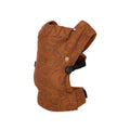 A baby carrier with a brown shell pattern, on a white background. 
