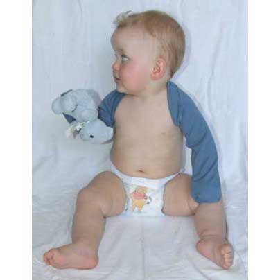 Baby wearing blue mitten sleeves against white background.