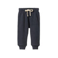 Cotton navy sweatpants with a beige drawstring on a white background